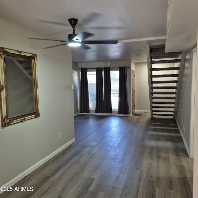 2946 N 14th St N Unit 14, Phoenix, AZ 85014 - unfurnished living room with ceiling fan and dark wood finished floors