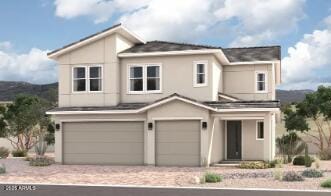 15854 W Miami St, Goodyear, AZ 85338 - view of front of house featuring an attached garage, stucco siding, and driveway