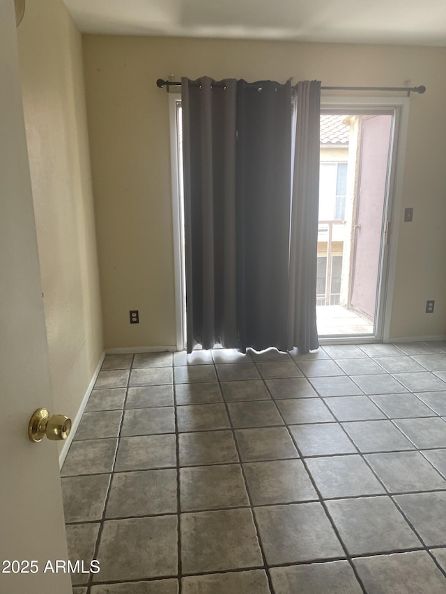 653 W Guadalupe Rd Unit 2019, Mesa, AZ 85210 - spare room with tile patterned floors