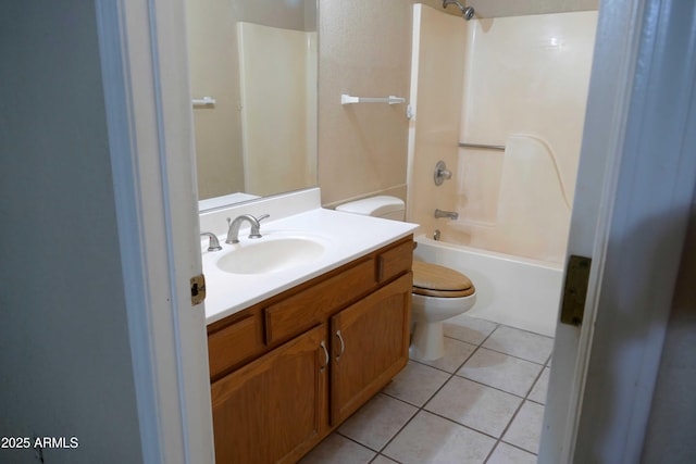 full bathroom with tub / shower combination, vanity, toilet, and tile patterned floors