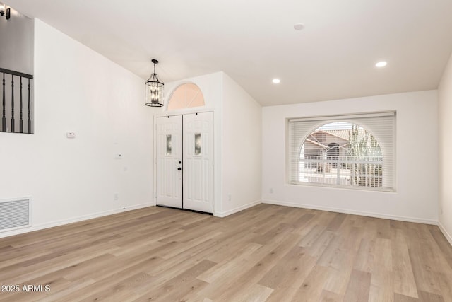 1202 E Libby St, Phoenix, AZ 85022 - foyer featuring a chandelier, light wood finished floors, baseboards, and recessed lighting