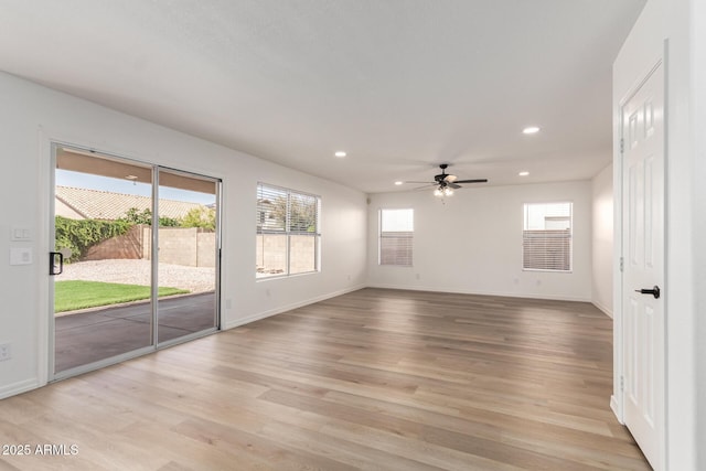 1202 E Libby St, Phoenix, AZ 85022 - spare room featuring recessed lighting, baseboards, a ceiling fan, and light wood-style floors