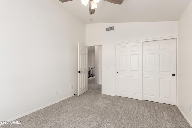 1202 E Libby St, Phoenix, AZ 85022 - unfurnished bedroom with carpet flooring, baseboards, lofted ceiling, a closet, and a ceiling fan