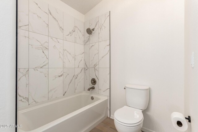 1202 E Libby St, Phoenix, AZ 85022 - bathroom featuring toilet, baseboards, and washtub / shower combination