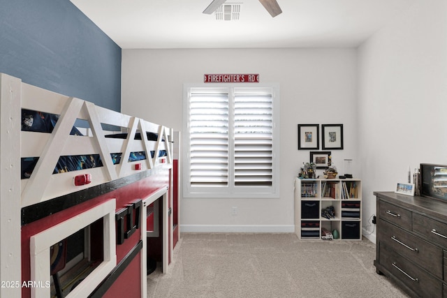 carpeted bedroom featuring ceiling fan