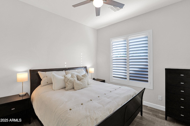 bedroom featuring ceiling fan and hardwood / wood-style flooring