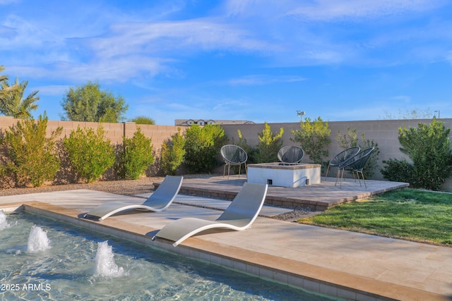 view of swimming pool with pool water feature