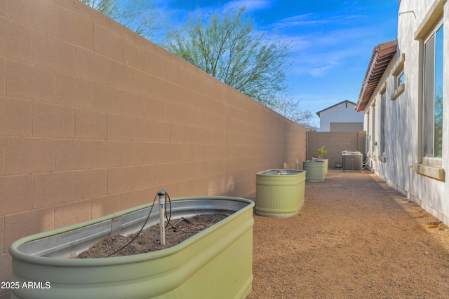 view of yard featuring central AC