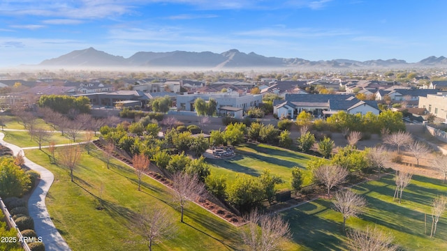 birds eye view of property featuring a mountain view