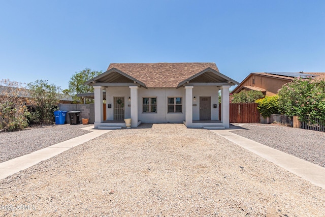 430 N 17th Ave, Phoenix, AZ 85007 - view of front of house featuring a shingled roof, stucco siding, and a porch