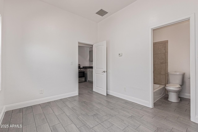 430 N 17th Ave, Phoenix, AZ 85007 - empty room with wood finish floors and baseboards