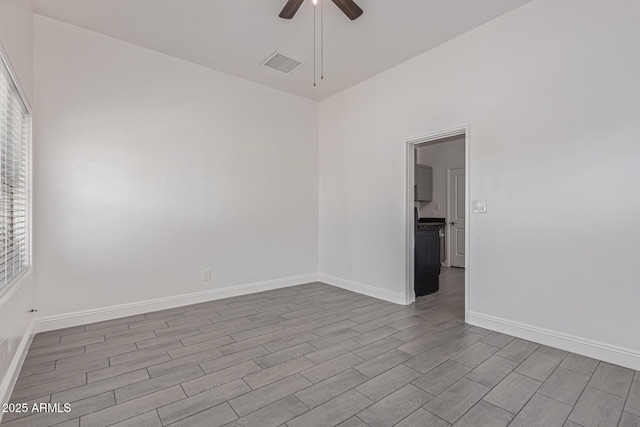430 N 17th Ave, Phoenix, AZ 85007 - empty room with a ceiling fan and dark wood finished floors