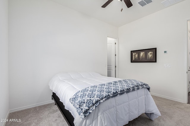 bedroom with carpet flooring, baseboards, and visible vents