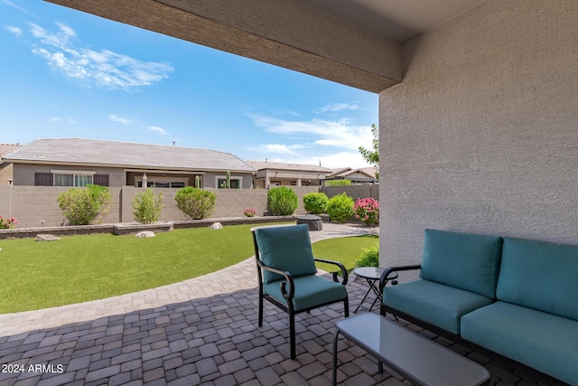 view of patio with an outdoor hangout area and a fenced backyard