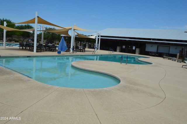 pool featuring a patio