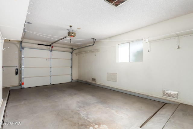 garage featuring visible vents