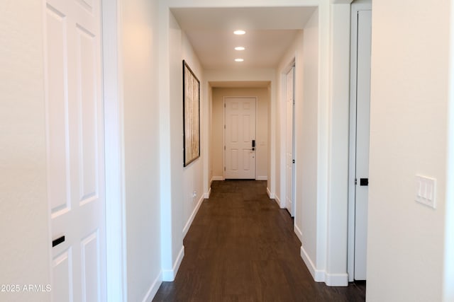 hallway featuring dark hardwood / wood-style flooring