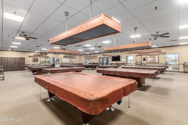 recreation room featuring carpet, ceiling fan, pool table, and a drop ceiling