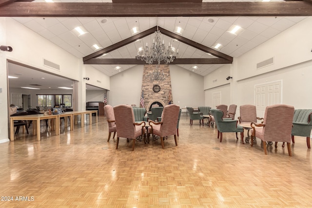 dining room with a fireplace, a chandelier, beamed ceiling, high vaulted ceiling, and light parquet floors