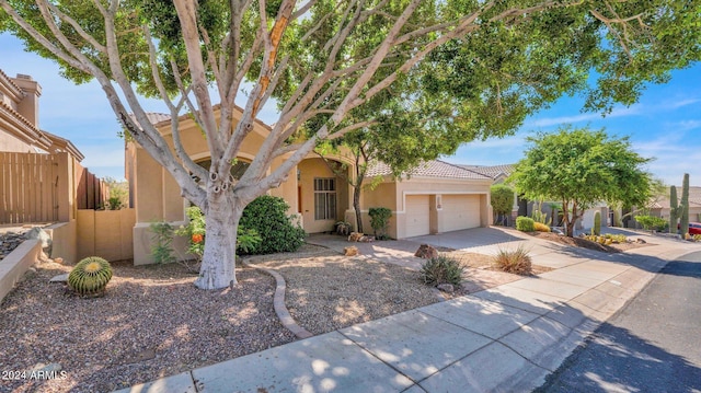 view of front of property featuring a garage