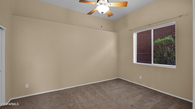 carpeted empty room with ceiling fan