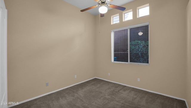 unfurnished room featuring ceiling fan and carpet floors