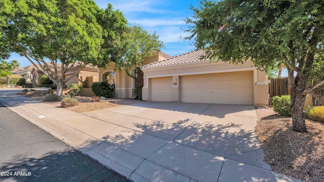 view of front of home with a garage