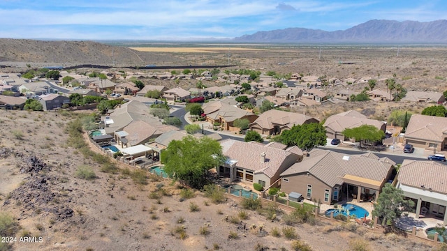 drone / aerial view featuring a mountain view