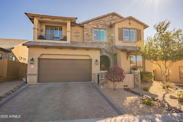 view of front of property with a balcony and a garage