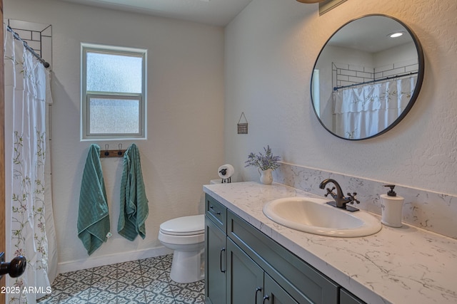 1014 Etta Ln, Show Low, AZ 85901 - bathroom with toilet, vanity, tile patterned floors, baseboards, and curtained shower