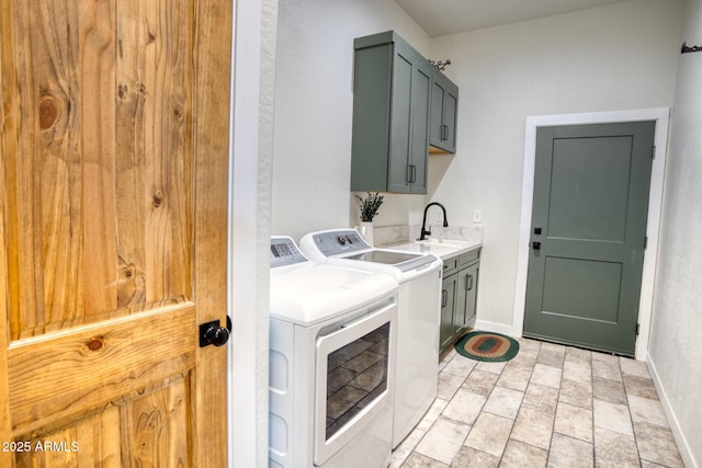 1014 Etta Ln, Show Low, AZ 85901 - laundry area featuring cabinet space, baseboards, washing machine and clothes dryer, and stone finish flooring