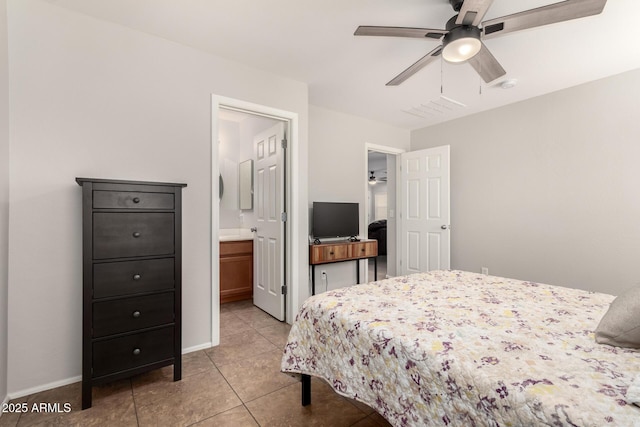 bedroom with light tile patterned flooring, a ceiling fan, baseboards, and connected bathroom