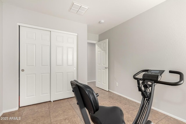 office area featuring visible vents, baseboards, and light tile patterned flooring