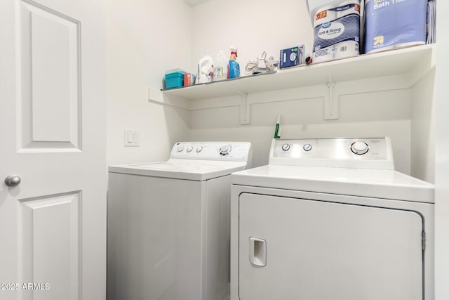 laundry room with independent washer and dryer