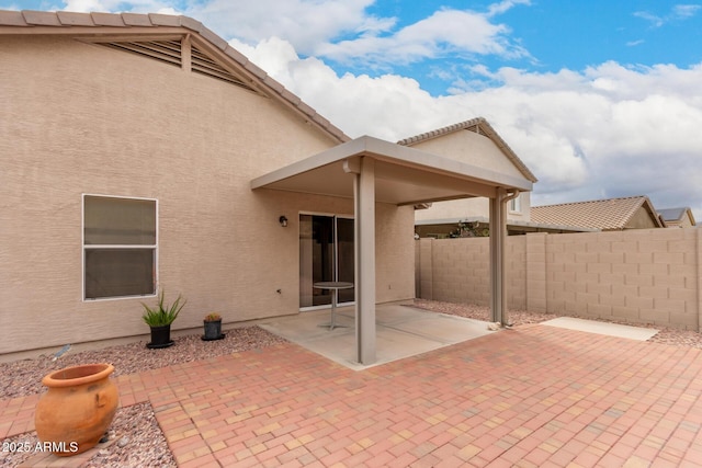 view of patio / terrace with fence