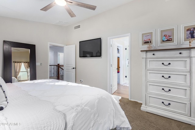 carpeted bedroom with ceiling fan