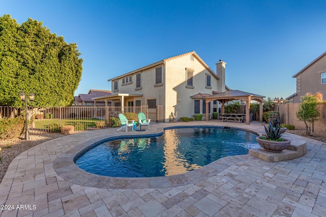 view of pool with a gazebo and a patio area