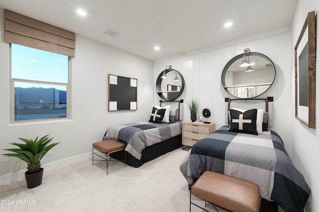 bedroom featuring a mountain view and carpet