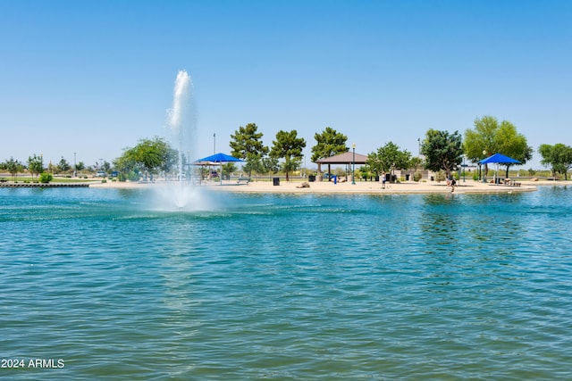 property view of water with a gazebo