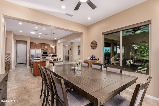 dining area featuring ceiling fan