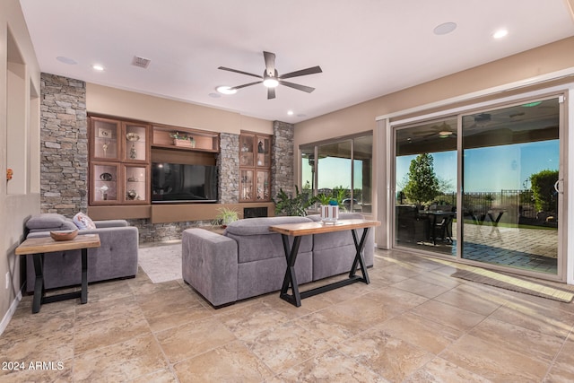 living room with ceiling fan