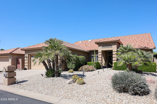 view of front of property with a garage