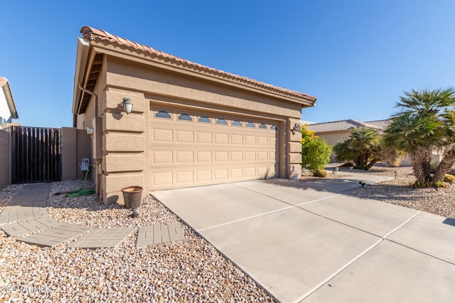 exterior space with a garage