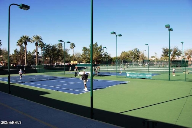 view of sport court featuring basketball hoop