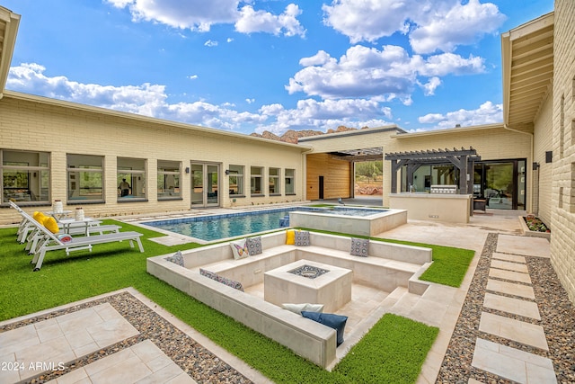 view of swimming pool featuring an in ground hot tub, a pergola, a patio area, and an outdoor fire pit