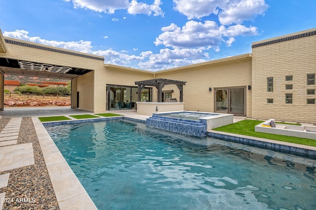 view of pool with a patio area, a pergola, and a pool with connected hot tub