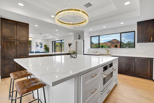 bedroom with recessed lighting, french doors, wood finished floors, and access to exterior