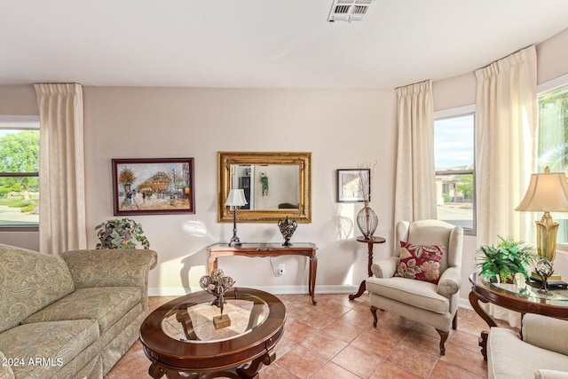 sitting room with light tile patterned floors