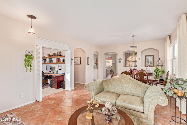 living room with light tile patterned floors