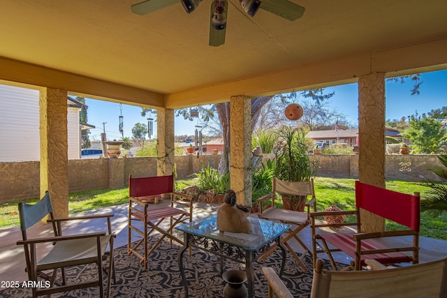 view of patio featuring ceiling fan